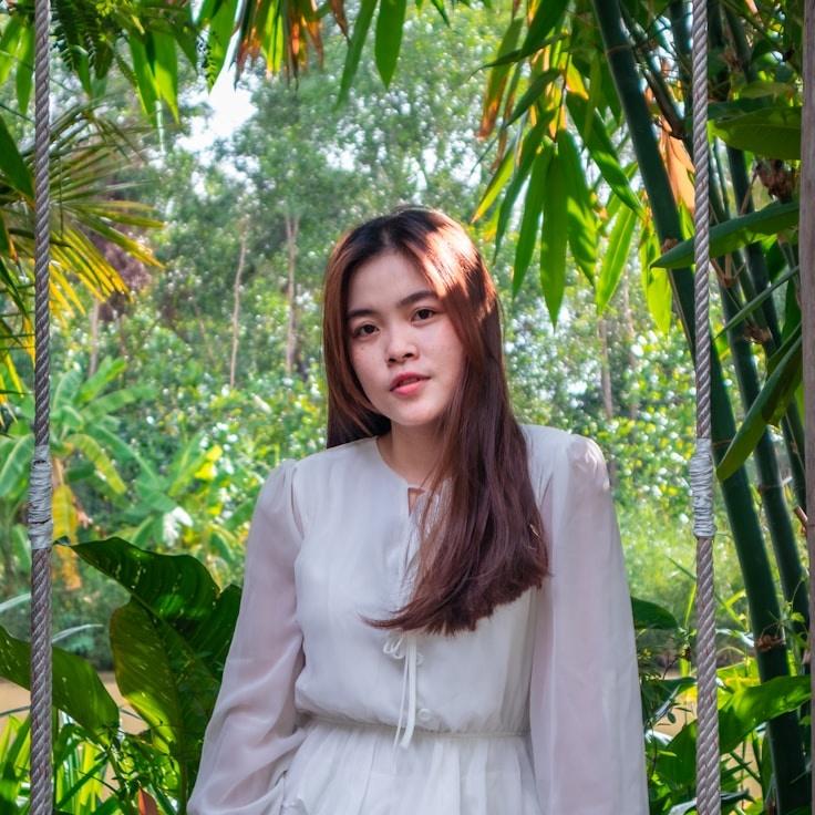 Portrait of Aria Chen, group coordinator and fusion cooking expert